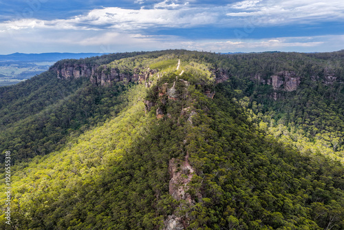 Aerial view over Hargraves Lookout in the Blue Mountains showcasing dramatic escarpments and expansive Grose Valley wilderness.