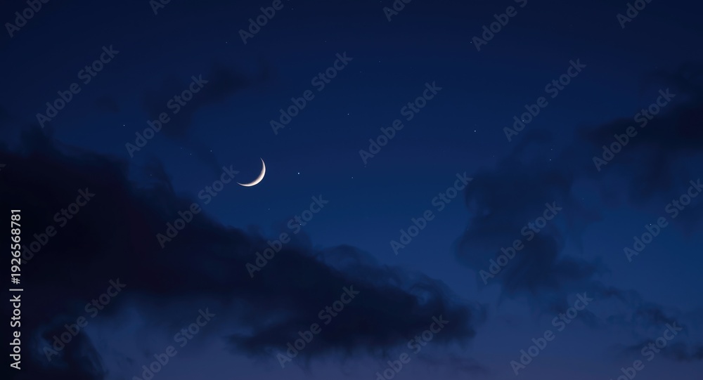 Fototapeta premium tranquil night sky featuring a crescent moon and soft drifting clouds