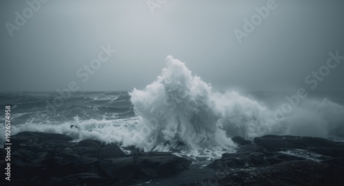 Stormy foggy seascape with energetic waves and low visibility