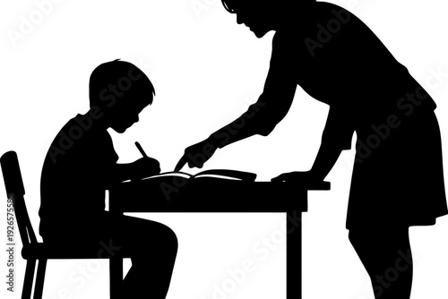 Silhouette of female teacher instructing young child at table in classroom setting.
