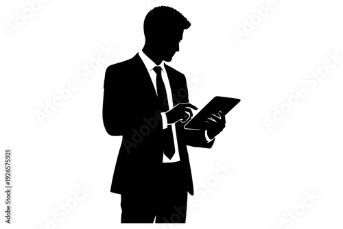 Silhouette of young caucasian male using tablet in formal attire.