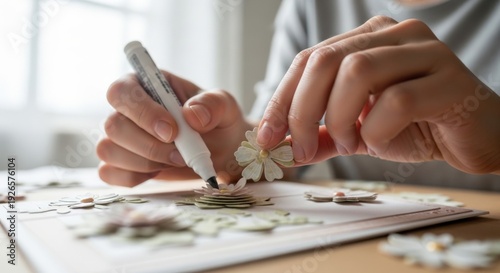 Hands gluing paper flower onto craft card — creative DIY, scrapbooking and personalized greeting for lifestyle, education and small business content