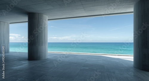 Modern concrete interior featuring cylindrical pillars and textured floor with ocean horizon