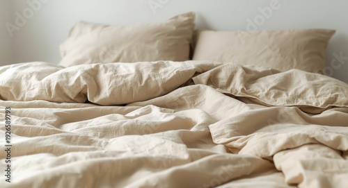 Soft texture beige muslin bedspread and pillowcases designed for cozy textile comfort