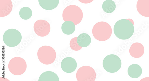 Soft pink and mint green polka dots on transparent background, playful circle pattern