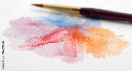 Watercolor artworks with light blur by dyed aquarelle paintbrushes