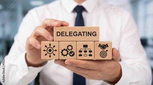 Delegating Leadership Business Organization Concept. Leader arranging wooden blocks with delegate concept. new
