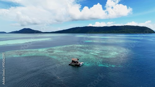 Aerial View of a Tropical Island Paradise at Raja Ampat Islands, Indonesian archipelago, West Papua, Indonesia	