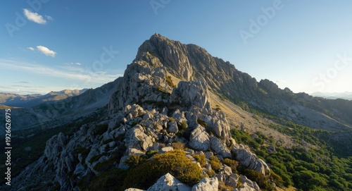 Rocky highland peak with br...