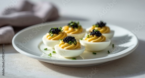 Elegant deviled eggs garnis...