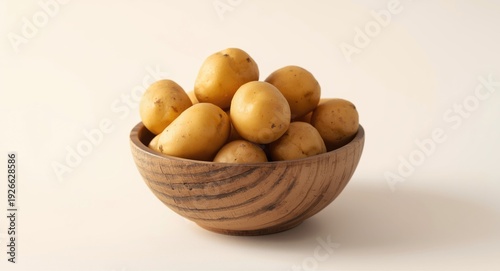 Small fresh potatoes in a r...