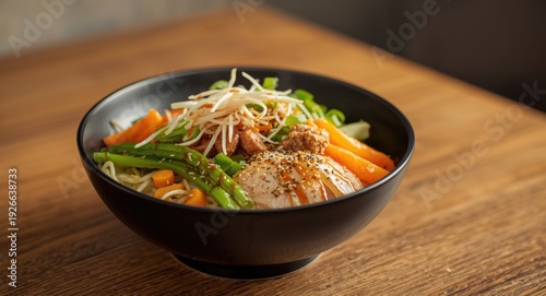 A vibrant noodle bowl serve...