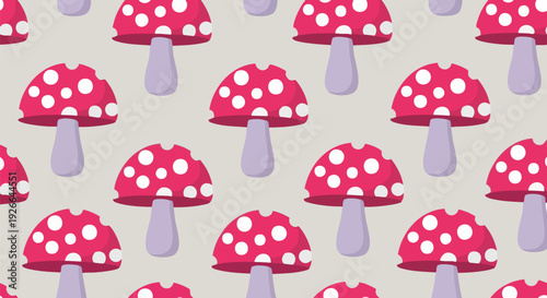 Red spotted mushroom seamless pattern. Created in flat cartoon style with pink, red, and light purple color palette.
