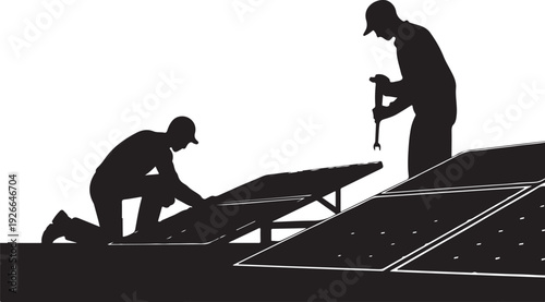 Silhouette of two workers installing solar panels on a roof