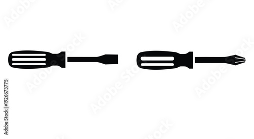 Two screwdrivers in a stark black silhouette