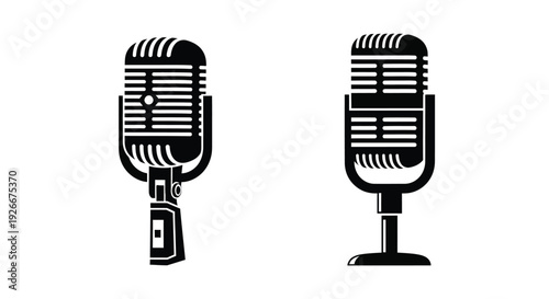 Two vintage microphones displayed in a striking black silhouette