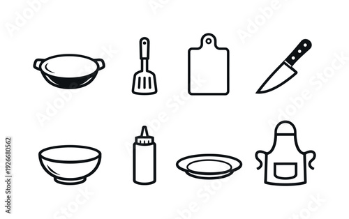 Home stir fry cooking tools: wok pan, spatula, cutting board, chef knife, mixing bowl, sauce bottle, serving plate, apron