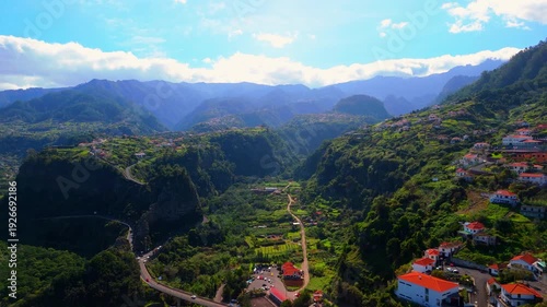 Drone Shot Over Green Mountains and Hillside Villages, Madeira Island Portugal