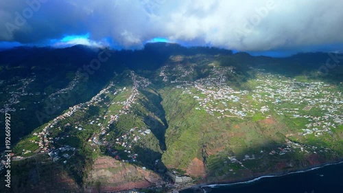 Aerial View of Green Valleys and Coastal Homes, Madeira Island Portugal