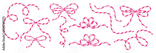Festive bows and swirls in the shape of classic pink and white candy canes are decorative Christmas vector elements for banners, cards, advertisements, and seasonal graphic layouts