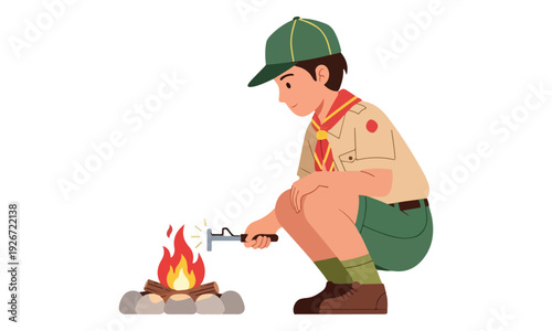 Boy Scout lighting a campfire with a long lighter