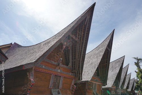 Photos Traditional Batak architecture featuring distinctive saddle-shaped roofs and int