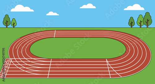 Empty red running track with six lanes and a starting line in a stadium on a sunny day with a blue sky, green grass, and trees in the background