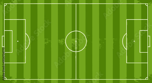 Top-down view of a vibrant green soccer field with white lines and goal areas, ready for a match.