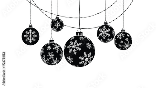 Black and white silhouette illustration of various Christmas ornaments hanging from strings and decorated with snowflakes.