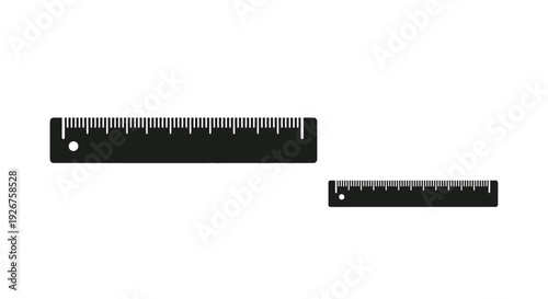 Black rulers with measurement markings against a white background silhouette