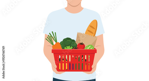 A person in a light blue shirt holds a red plastic basket filled with fresh vegetables and a baguette against a white background.