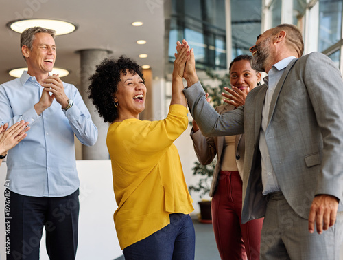 Wallpaper Mural Portrait of a businesswoman celebrating during a meeting in office, group of businesspeople celebrating success, applauding and smiling, teamwork concept Torontodigital.ca