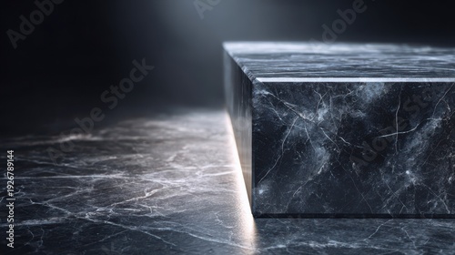 Dark marble surface glistens with soft light