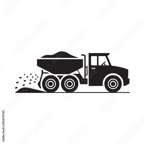 Silhouette of a dump truck or agricultural spreader vehicle dispersing material like sand, salt, or fertilizer on a surface