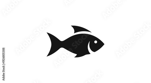 Silhouette of a fish against a black background for design purposes