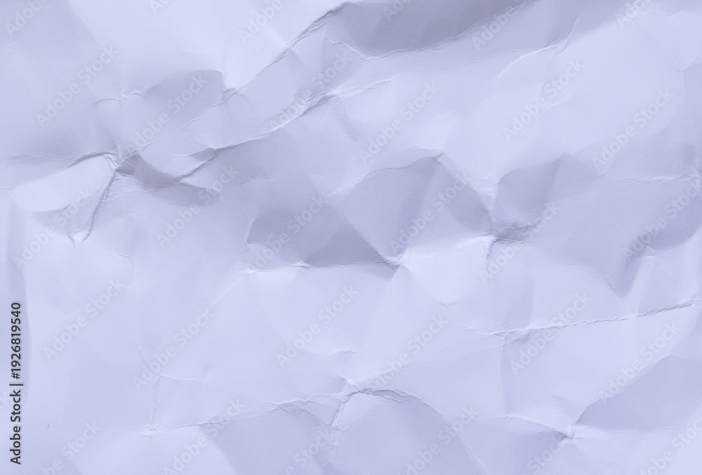 Obraz premium Crumpled White Paper Texture Background with Soft Shadows,A top-down, close-up view of a wrinkled and crumpled white paper sheet, showcasing a detailed abstract texture with subtle highlights.