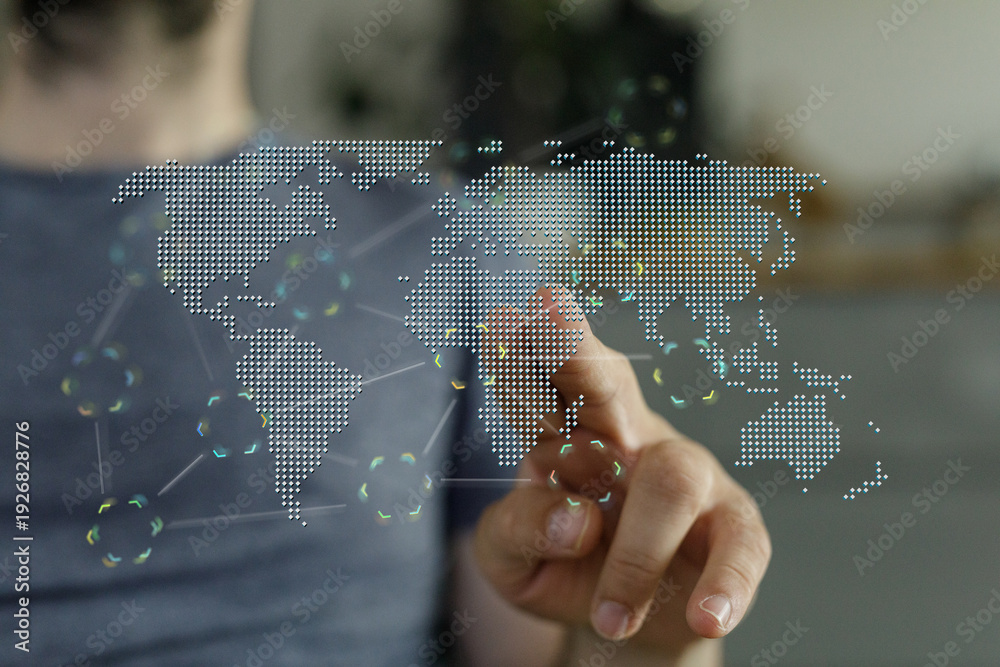 Fototapeta premium Person interacting with a digital world map concept, symbolizing global networking, future technology, and internationa