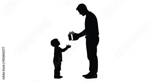Father giving a gift to his son a loving family moment silhouette