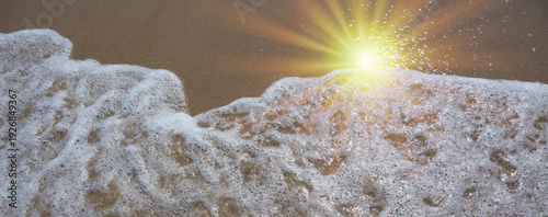 Sea wave and sunlight in good weather.
