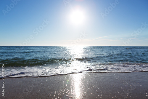 Sea Horizon with Sun Reflection on Sparkling Water.