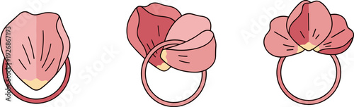 Delicate floral hair ties with pink petals and gold accents on a white background