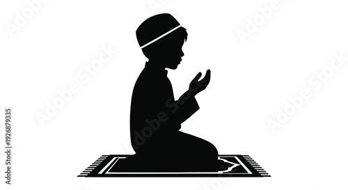 A young muslim boy praying on a rug black silhouette