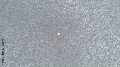 Snow on the car window, snowflakes on the car glass.
Trees in the snow. Winter landscape. Snow covered trees. Selective focus
