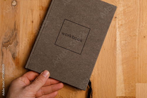 Close-up of workbook laying...