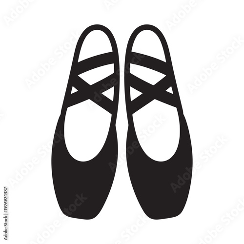 A pair of black pointe ballet shoes viewed from above