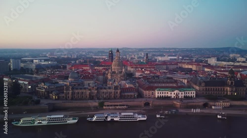 Aerial footage of Dresden's Old Town rising above the Elbe River at dawn