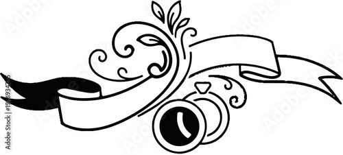 Ornate scrollwork with a banner and wedding rings