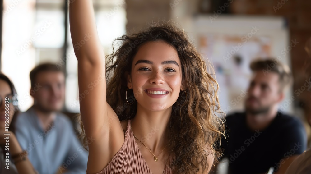 Obraz premium Young woman raises hand during group discussion in a casual setting with friends