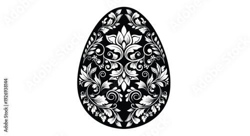 An ornate black Easter egg with intricate floral damask patterns on a white background.