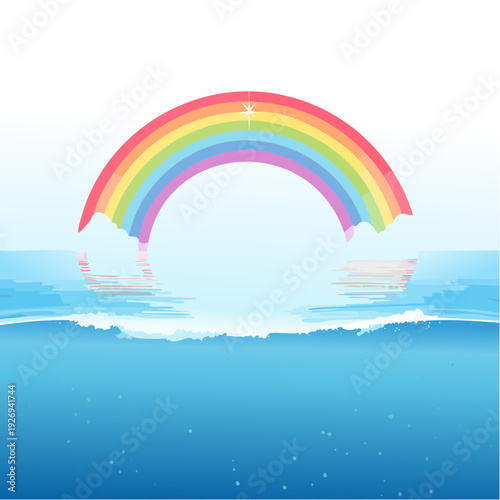 A beautiful rainbow arc over calm ocean waves with a reflection on a clear sky
